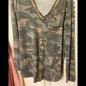 Bibi long sleeve top with gold sparkle detail.